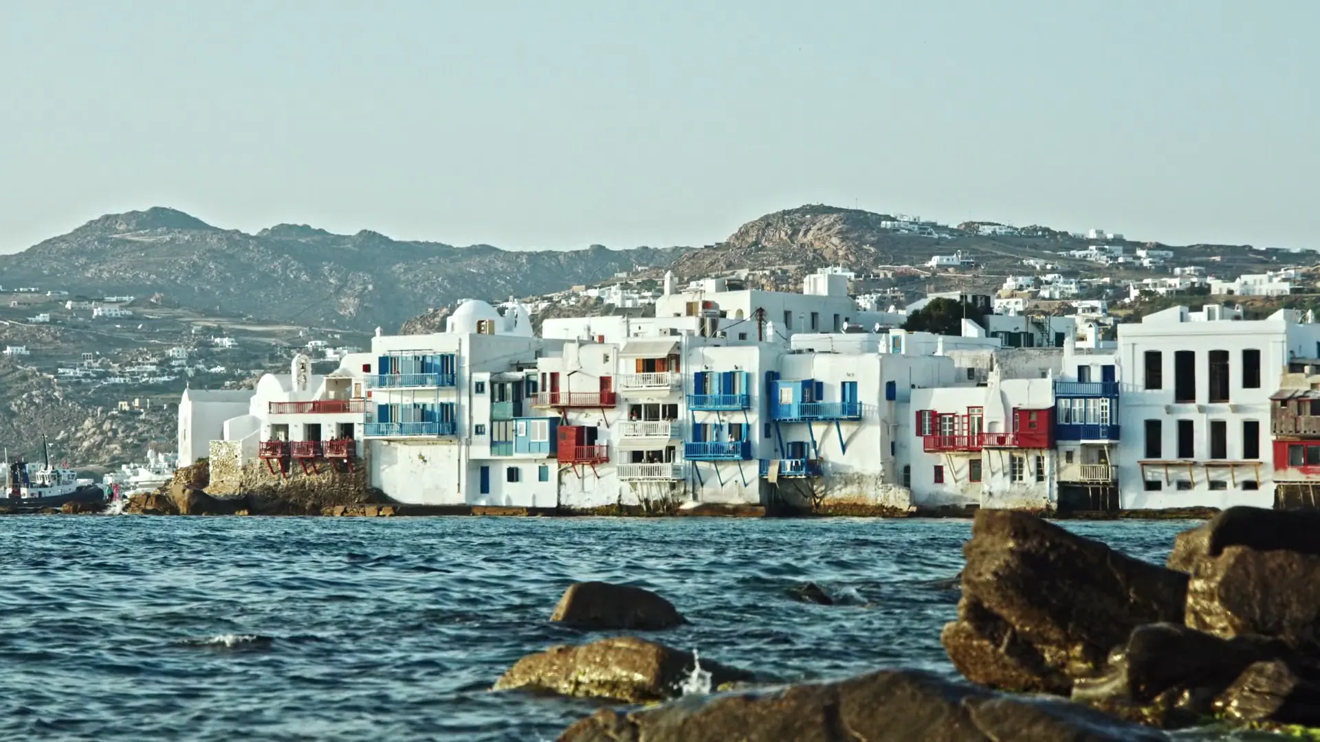 The waterfront houses of Little Venice, Mykonos, seen from the sea